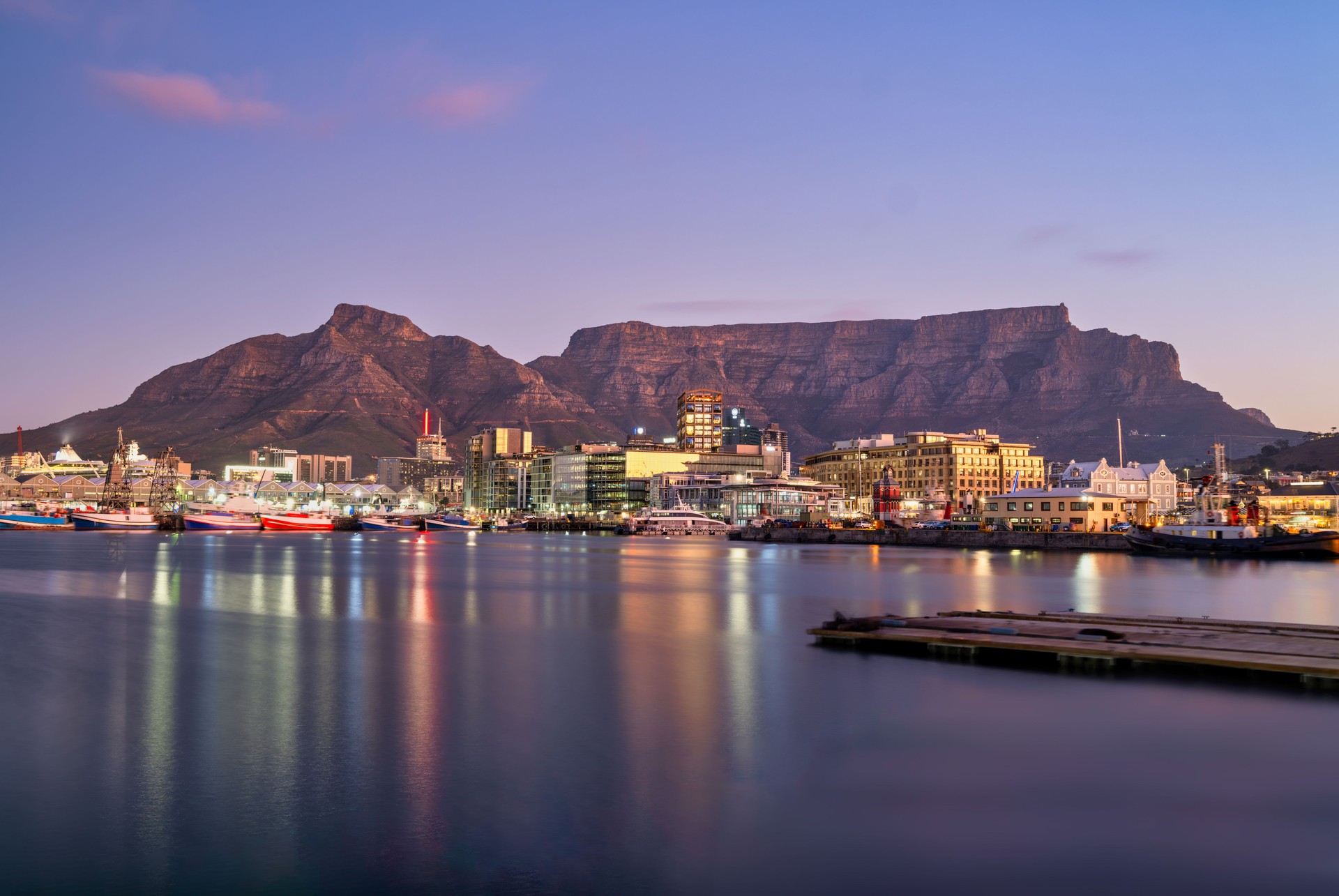 victoria & alfred v&a waterfront and table mountain in the background after sunset, Cape Town, South Africa